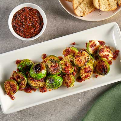 Crispy Brussels Sprouts, Tuscan Tomato ‘Nduja Vinaigrette